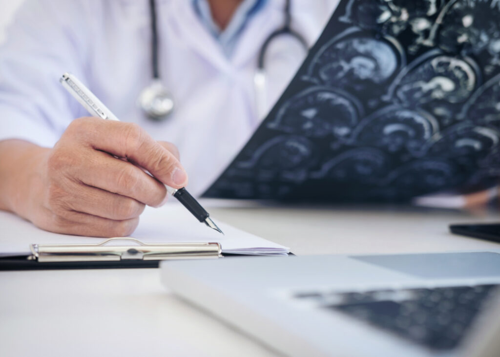 Doctor analyzing brain images