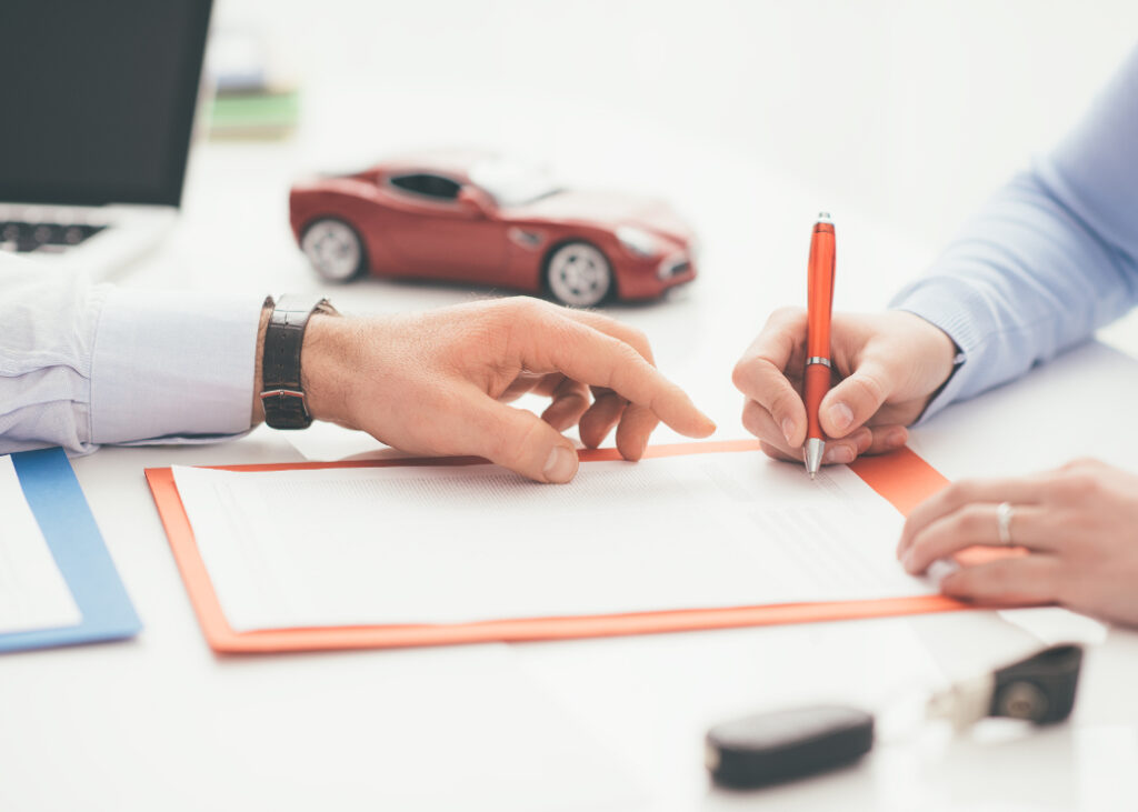 Insurance adjuster filling out legal documents.