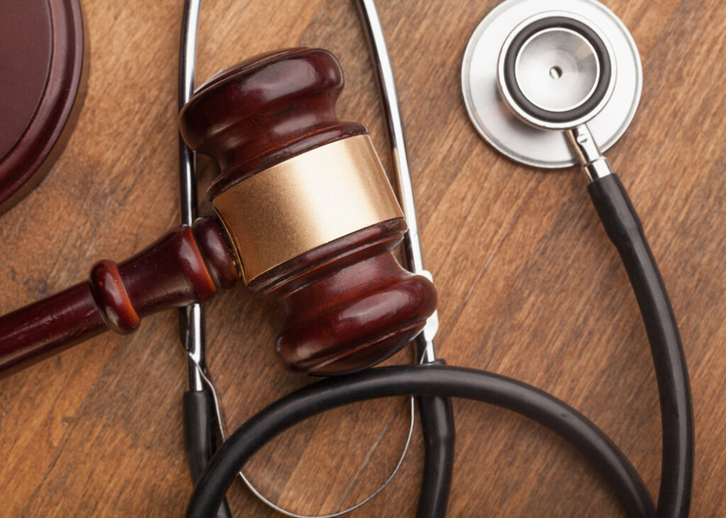 Stethoscope and judgement hammer
