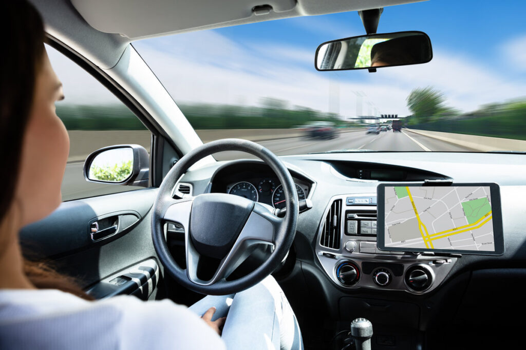 Close-up Of A Woman Traveling By Self Driving Modern Car