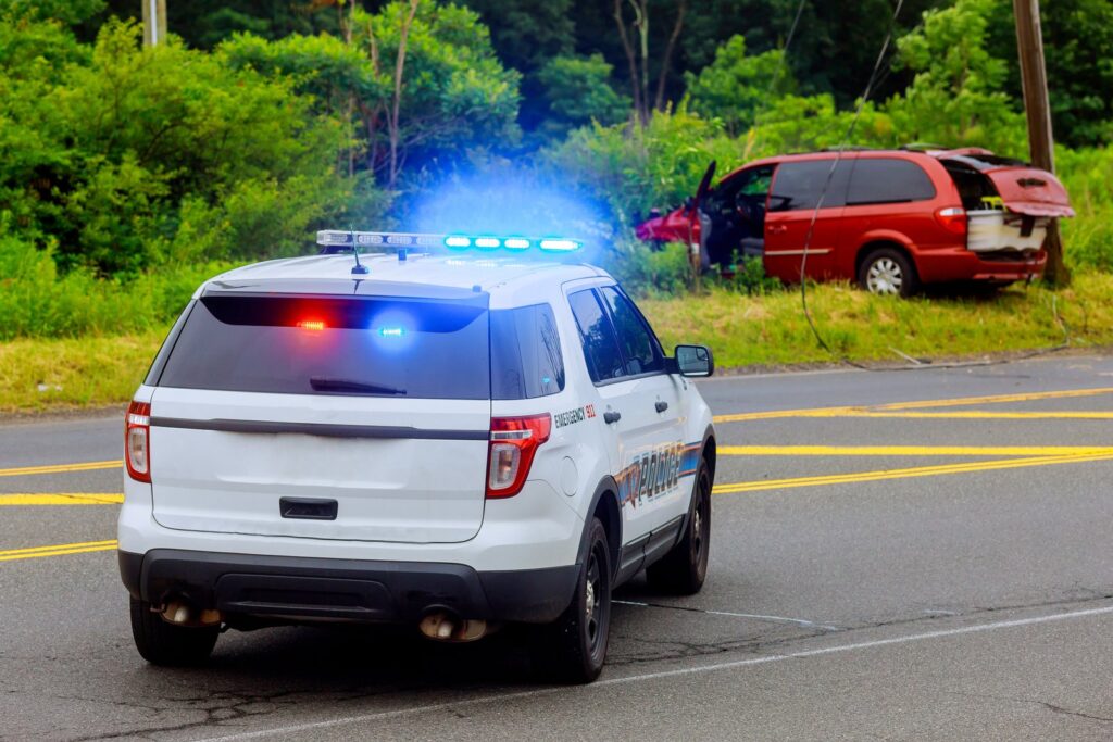 Police responding at the scene of a car accident in California